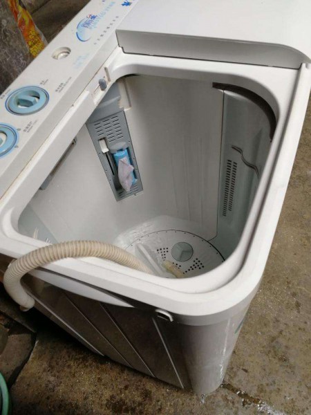 半自动洗衣机不存水怎么修